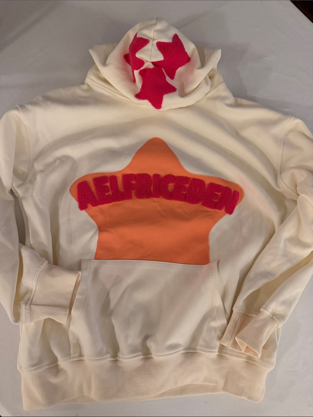 Aelfriceden Cream Star Hoodie with Orange & Hot Pink Appliqué size small